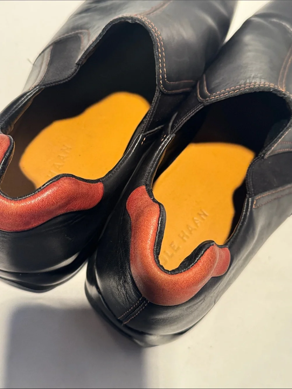 Cole Haan Black Leather Slip-On Loafers with Brown Heel Tab